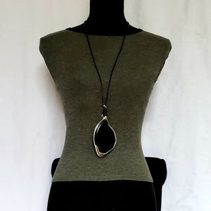 Long rope necklace with lage medallion